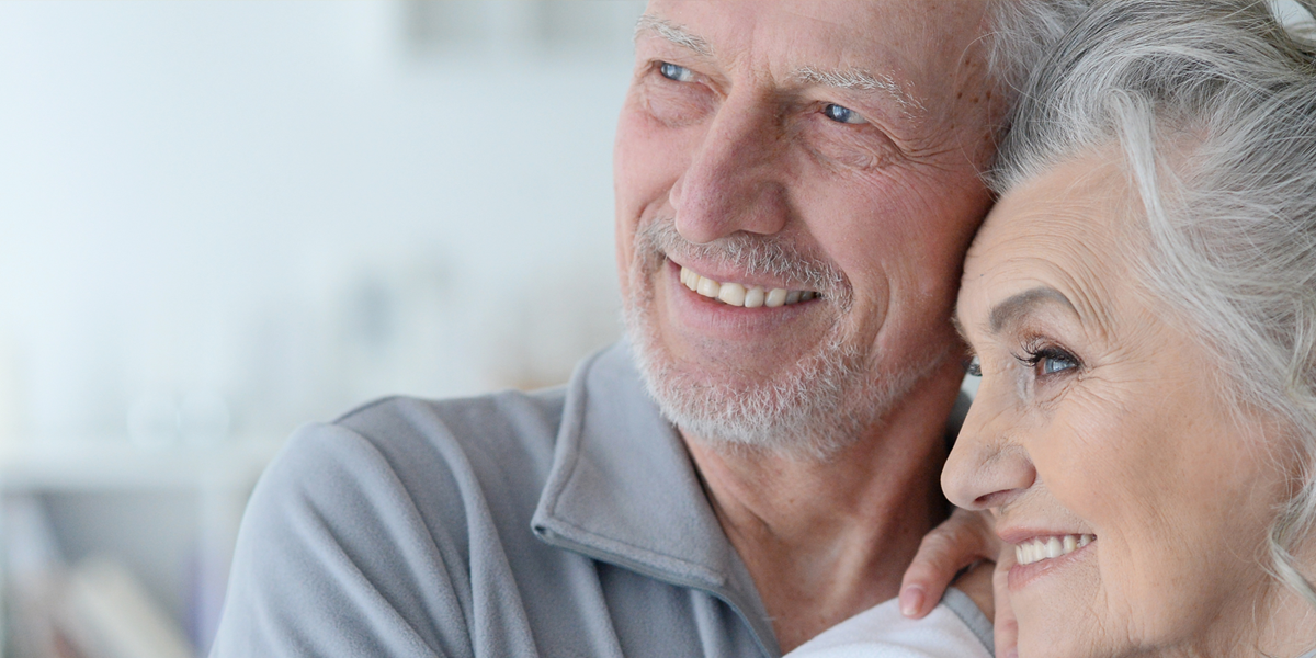 Man and woman smiling